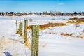 A barb wire fence in a snow covered field Royalty Free Stock Photo