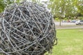 Barb wire rolled up into a ball shaped ornament Royalty Free Stock Photo