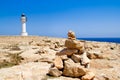 Barbaria formentera Lighthouse make a wish stones Royalty Free Stock Photo