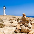 Barbaria formentera Lighthouse make a wish stones Royalty Free Stock Photo