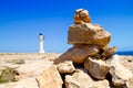 Barbaria formentera Lighthouse make a wish stones Royalty Free Stock Photo