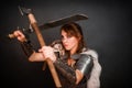 Barbarian woman warrior in chainmail armor with bracers, armor shoulder pad, polar fox fur on her shoulders Royalty Free Stock Photo