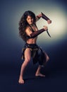 Barbarian woman warrior. Ritual dance with a knife. Royalty Free Stock Photo