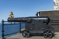 Barbary macaque on cannon barrel Gibraltar