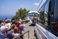 Tourist watch barbary macaques in Gibraltar