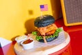 Barbecue burger - pork with barbecue sauce with cheese, onion rings and bacon burger Royalty Free Stock Photo