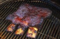 Barbecue burnt chuck beef ribs marinated and sliced with hot chili sauce Royalty Free Stock Photo