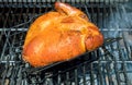 Barbecue with chicken grilling on a summer barbecue top view