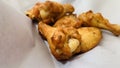 barbecue chicken wings or buffalo wings close up on wooden tray shot with selective focus Royalty Free Stock Photo