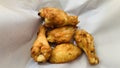 barbecue chicken wings or buffalo wings close up on wooden tray shot with selective focus Royalty Free Stock Photo