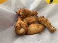 barbecue chicken wings or buffalo wings close up on wooden tray shot with selective focus Royalty Free Stock Photo