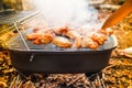 Barbecue chicken wings grilling fire,  bbq outdoors Royalty Free Stock Photo