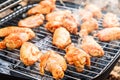 Barbecue chicken wings grilling fire,  meat Royalty Free Stock Photo
