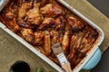 Barbecue chicken wings. Slow cooker sweet and spicy. Oven baked marinated chiken in blue ceramic tray Royalty Free Stock Photo