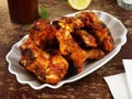 Fine Meat Barbecue - Chicken Wings on wooden Background Royalty Free Stock Photo