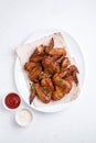 Barbecue chicken wings on white background. Top view Royalty Free Stock Photo