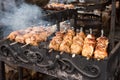 Barbecue with delicious grilled meat on grill. Beef kababs over charcoal Royalty Free Stock Photo