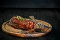 Barbecue Dry aged Ribeye Steak with knife and fork on cutting board Royalty Free Stock Photo