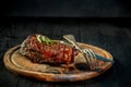 Barbecue Dry aged Ribeye Steak with knife and fork on cutting board Royalty Free Stock Photo