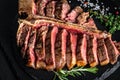 Barbecue dry aged Wagyu Porterhouse Steak. Beef T-Bone juicy steak Medium rare beef. American cuisine. Food recipe background. Royalty Free Stock Photo