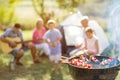 Barbecue and family on camping