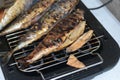 Barbecue with fish. Grilled mackerel fish. Royalty Free Stock Photo