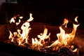 Smoulder charcoal texture.Barbecue Flaming Charcoal Grill With Bright Flames Of Fire.Selective focus. burning wood and