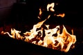 Smoulder charcoal texture.Barbecue Flaming Charcoal Grill With Bright Flames Of Fire.Selective focus. burning wood and Royalty Free Stock Photo