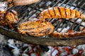 Barbecue grill bbq on coal charcoal grill with steaks bratwurst sausages and meat delicious summer meal Royalty Free Stock Photo