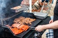 Barbecue grill bbq on propane gas grill steaks bratwurst sausages meat meal Royalty Free Stock Photo
