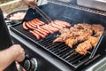 Barbecue grill bbq on propane gas grill steaks bratwurst sausages meat meal Royalty Free Stock Photo