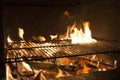 Barbecue grill on fire before receiving the meat