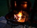 Barbecue Grill With Flaming Charcoal Briquettes Royalty Free Stock Photo