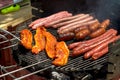 Barbecue grill with sausage, merguez and pork Royalty Free Stock Photo