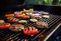 barbecue grill with sizzling veggie burgers