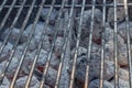 Barbecue grillage with hot coal briquets under it. Royalty Free Stock Photo