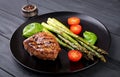 Barbecue grilled beef steak meat with asparagus Royalty Free Stock Photo