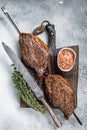 Barbecue grilled dry aged wagyu Brazilian picanha from the sirloin cap beef meat. White background. Top view Royalty Free Stock Photo