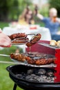 Barbecue with grilled sausages Royalty Free Stock Photo