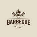 barbecue logo vintage vector illustration template icon graphic design. BBQ grill with flame and meat spatula sign or symbol for Royalty Free Stock Photo