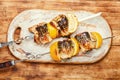 Barbecue mackerel fish on skewers Royalty Free Stock Photo