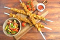 Barbecue meat. Chicken kebab. Chicken Shashlik with vegetables on wooden background. Royalty Free Stock Photo