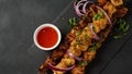 Barbecue meat. Chicken kebab. Chicken Shashlik with vegetables on wooden background. Royalty Free Stock Photo