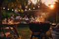 Barbecue party with people in the background, grilled steak, grilled meat and vegetables, summer party, barbecue in the garden, Royalty Free Stock Photo