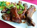 Barbecue pork spare ribs on a plate. Chinese food.