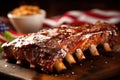Barbecue Ribs with Grilled Potatoes on Wooden Cutting Board