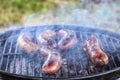 Barbecue sausages on the grill.