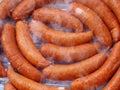 Barbecue sausages in the grill smoke