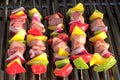 Barbecue. Shish kebab with grilled peppers and onion, on hot grill Royalty Free Stock Photo