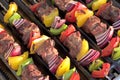 Barbecue. Shish kebab with grilled peppers and onion, on hot grill Royalty Free Stock Photo